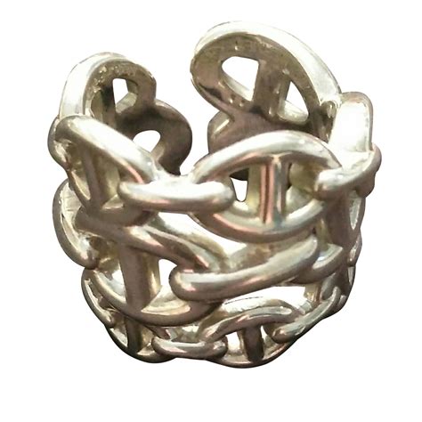 hermes intricate silver ring.